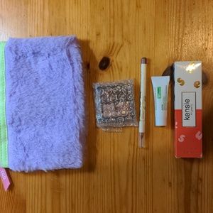 Cosmetic subscription including pouch